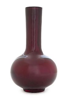* An Opaque Red Peking Glass Vase Height 9 3/4 inches. 紅料長頸瓶，高9.75英吋