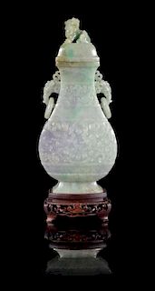 An Apple Green and Lavender Jadeite Covered Vase Height: 10 inches. 翡翠雕饕餮紋雙獸耳蓋瓶，19/20世紀，高10英吋