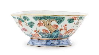 * A Famille Rose Porcelain Bowl Height 3 1/2 inches, diameter 8 1/2 inches. 粉彩供碗，19世紀中后期，高3.5英吋，直徑8.5英吋
