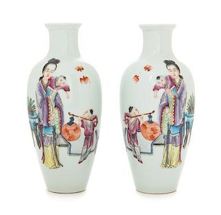 A Pair of Famille Rose Porcelain Vases Height of each 7 1/4 inches. 粉彩人物圖瓶一對，高7.25英吋