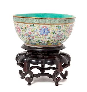 * A Famille Rose Porcelain Bowl Diameter 5 3/4 inches. 粉彩纏枝花卉紋碗，清道光，寬5.75英吋