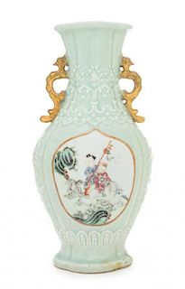 A Famille Rose and Celadon Glazed Porcelain Vase Height 12 inches. 豆青釉貼花粉彩開光嬰戲圖鳳耳海棠式瓶，晚清/民國，高12英