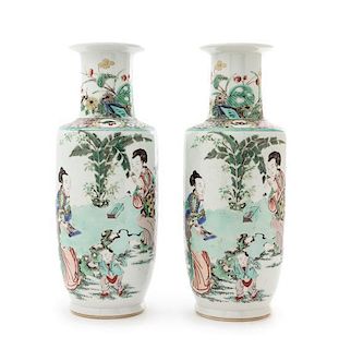 A Pair of Famille Verte Rouleau Vases Height of each 11 1/8 inches. 素三彩仕女嬰戲圖小棒槌瓶一對，高11.125英吋