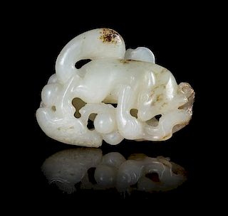 A White Jade Toggle Length 2 1/4 inches. 白玉雕松鼠葡萄擺件，長2,25英吋