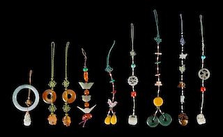 A Collection of Nine Jade Toggle Lanyards Length of longest 9 1/4 inches. 寶石掛件九件，最大长9.25英吋