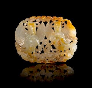 A Yellow Jade Plaque Length 2 1/2 inches. 黄玉鏤雕人物牌，長2.5英吋