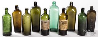 Group of olive green bottles, 19th c.