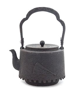 A Japanese Cast Iron Teapot Height 9 1/2 inches.