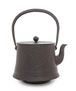 A Japanese Cast Iron Teapot Height over handle 10 inches.