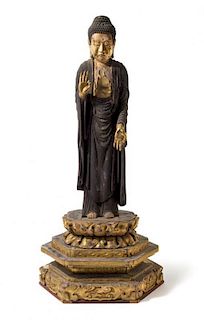 A Parcel Gilt Lacquered Wood Figure of Amida Buddha Height 28 inches.