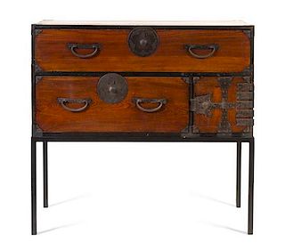 An Iron Mounted and Lacquered Tansu Chest on Stand Height 40 x width 42 x depth 17 inches.