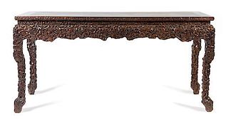 A Hardwood Console Table Height 35 x width 71 1/2 x depth 25 1/4 inches. 硬木雕長條桌，20世紀初，高35x寬71.5x深25.25英吋