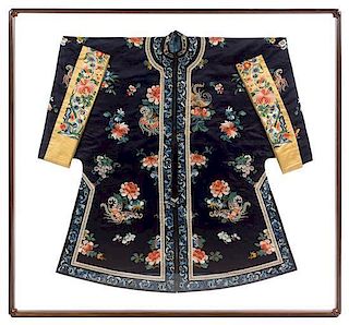 A Chinese Embroidered Silk Lady's Robe Height collar to hem 43 1/2 inches. 深藍地緞繡花卉紋女袍，晚清，高43.5英吋