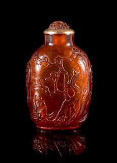 A Carved Amber Snuff Bottle Height 2 3/4 inches. 琥珀踏雪尋梅鼻煙壺，清乾隆，高2,75英吋