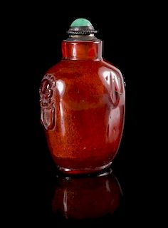 An Amber Snuff Bottle Height 3 inches. 琥珀鋪首耳鼻煙壺，清乾隆，高3英吋