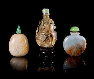 Three Jadeite Snuff Bottles Height of tallest 3 3/4 inches. 翡翠鼻煙壺三件，最大高3.75英吋