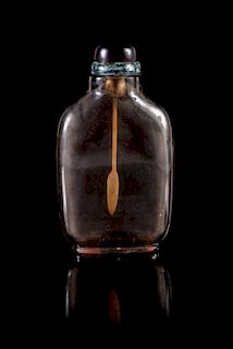 A Smokey Crystal Snuff Bottle Height 3 1/4 inches. 茶色水晶鼻煙壺，高3.25英吋