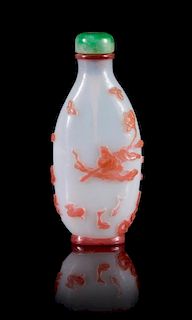 A Red Overlay White Peking Glass Snuff Bottle Height 3 inches. 白地套紅料仙人乘槎圖鼻煙壺，高3英吋