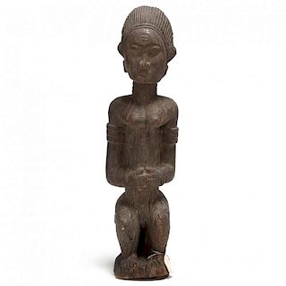Ivory Coast, Early Baule Figure of a Seated Female