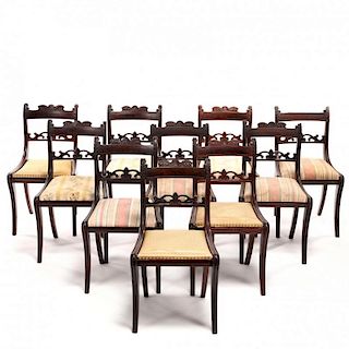 A Set of Ten Classical Carved Dining Chairs