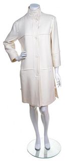 A Courreges Cream Wool Coat, Size 00.