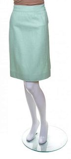 A Group of Three Courreges Skirts, Mint and navy, Size A, blue Size B.