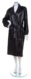 An Yves Saint Laurent Black Leather Trench Coat,