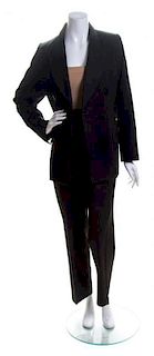 An Yves Saint Laurent Black Wool Tuxedo, Jacket size 42.