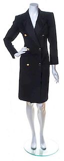 An Yves Saint Laurent Black Wool Double Breasted Coat, Size 34.