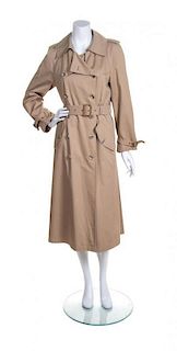An Yves Saint Laurent Double Breasted Trench Coat,