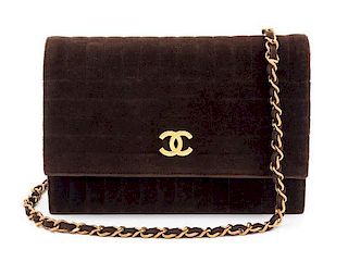 A Chanel Brown Velvet Handbag, 8.5" x 6" x 1".