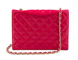 A Chanel Red Leather Quilted Flap Bag, 9" x 7" x 2".