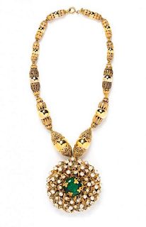 A Chanel Gold Filigree Pendant Necklace, 16" length, pendant 2.5".