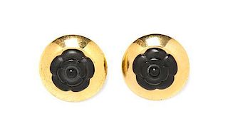 A Pair of Chanel Goldtone and Black Camelia Earclips, 1.5".