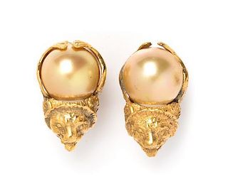 A Pair of Chanel Champagne Pearl and Goldtone Lion Head Earclips, 1"x 1".