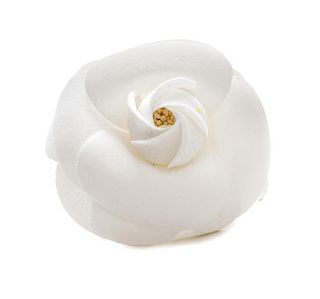 * A Chanel White Fabric Camelia Brooch, 3" x 2.5".