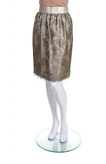 * A Bill Blass Champagne Lace Skirt, Size 8.
