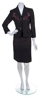 * A Carolina Herrera Black and Brown Wool Suit, Size 8.
