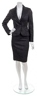 A Dolce & Gabbana Black Patterned Skirt Suit, Size 40.