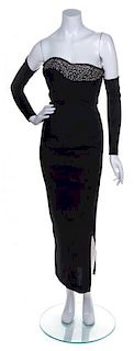 A Gianni Versace Black Column Strapless Gown, Size 38.