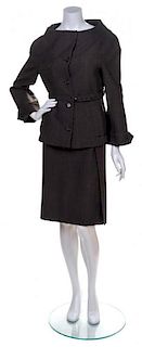 A Prada Olive Wool Plaid Skirt Suit, Jacket size 44, skirt size 42.