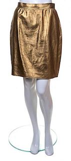 An Ungaro Gold Leather Skirt, Size 12.