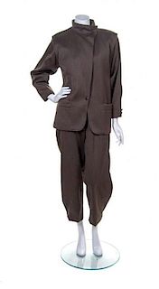 A Genny Olive Wool Pant Suit, Jacket size 6, pants size 8.