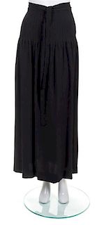 An Yves Saint Laurent Black Pleated Long Skirt, Size 34.