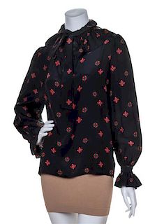A Yves Saint Laurent Black Silk Patterned Blouse, Size 40.