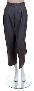 A Pair of Yves Saint Laurent Grey Wool Pleated Pants, Size 38.
