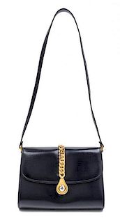 A Gucci Navy Leather Flap Handbag, 8" x 6" x 2".