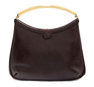 A Judith Leiber Brown Leather Clutch, 7.5" x 5.5" x 1.5".