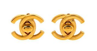 A Pair of Chanel Goldtone Logo Earclips, 1".
