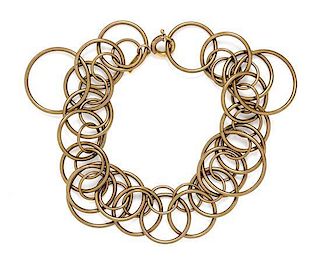 An Etro Goldtone Circular Link Necklace, 17" x 3".